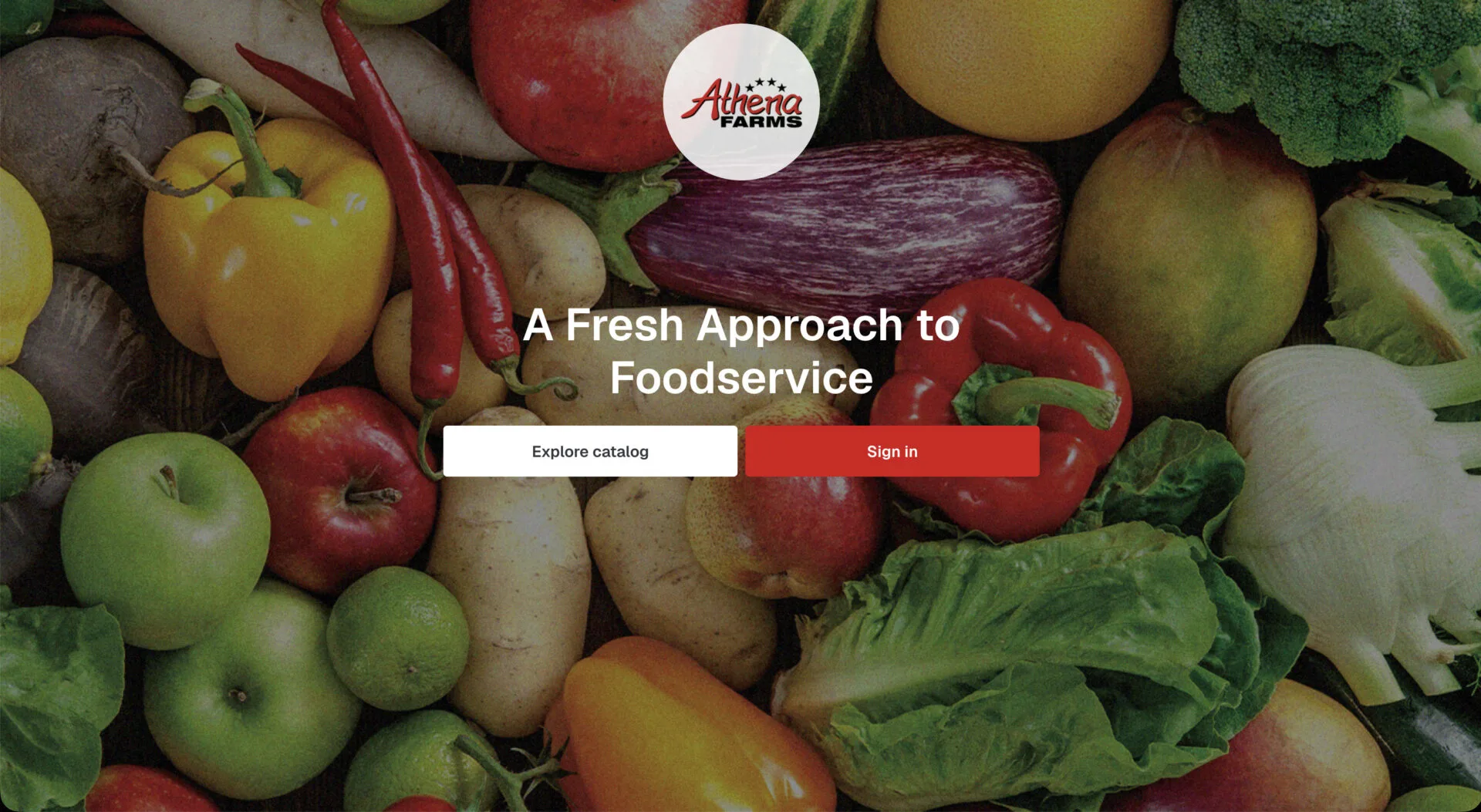 Alberta Farms fresh produce display featuring apples, peppers, eggplant, and lettuce for wholesale foodservice distribution.