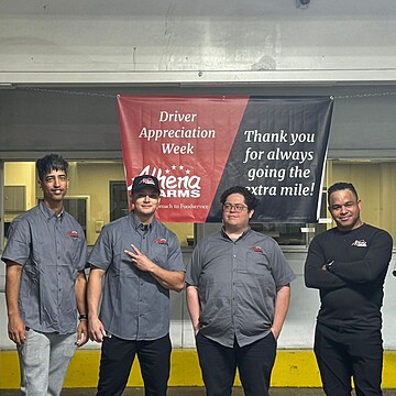 Celebrating Driver Appreciation Week at Almena Farms with teamwork and camaraderie in the warehouse.